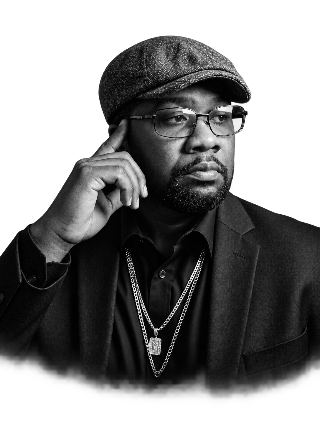 EuphoricMusic DJ in a black suit and flat cap